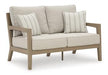 Hallow Creek Outdoor Loveseat with Cushion - Furniture Max (Falls Church,VA) *